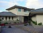 Exterior view of custom home michael Rust architect  Frank lloyd wright inspired custom home plans by former taliesin fellow